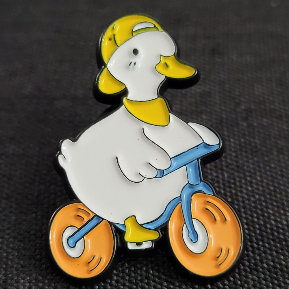 Ducky Buddy On A Bike Enamel Pin